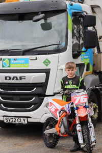 motocross rider Ricky Barrack standing in front of Keenan Recycling food waste truck